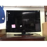 A 31" Sanyo TV with remote