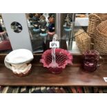 A cranberry glass basket & jug & a Staffordshire Arthur Bowker character jug of Henry VIII