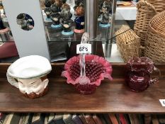 A cranberry glass basket & jug & a Staffordshire Arthur Bowker character jug of Henry VIII