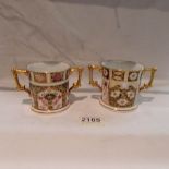 A pair of Royal Crown Derby loving cups