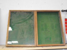 An oak notice board display cabinet