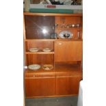 A teak effect wall unit