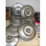 4 Daimler and 3 Jaguar hubcaps