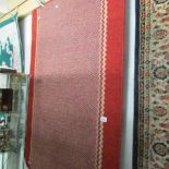 A red patterned rug.