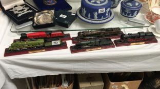5 Locomotives mounted on wooden bases