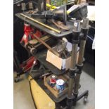 A set of adjustable workshop shelves on wheels