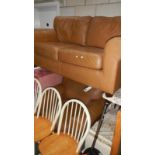 A 2 seater sofa and an armchair