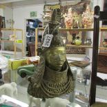 A 1980's Benin bronze of the Chief of Osuma or The Benin Kingdom of Nigeria.