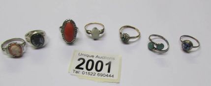 A 9ct gold ring, a silver ring and 5 other rings.