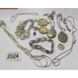 A mixed lot of white metal jewellery including 2 lockets, bracelets, chains etc (some silver).