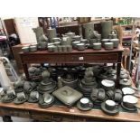 Over 240 pieces of Denby Chevron tea & dinnerware including coffee & tea cups, saucers, teapots,