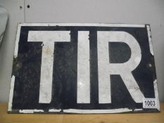 A 'TIR' metal sign