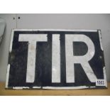 A 'TIR' metal sign