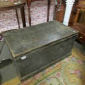 An old wooden tool chest containing good woodworking tools, chisels, planes etc.