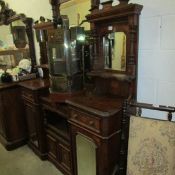 A Victorian inlaid mahogany mirror backed sideboard.