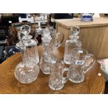 A quantity of decanters & cut glass etc