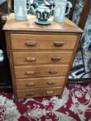 A 5 drawer chest of drawers