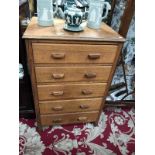 A 5 drawer chest of drawers