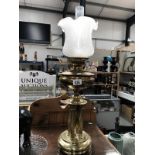 A brass 4 Corinthian column oil lamp