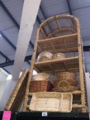 A quantity of wicker items including a shelf unit, baskets, wooden bowls etc.