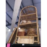 A quantity of wicker items including a shelf unit, baskets, wooden bowls etc.