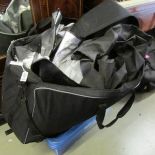 A bag and box of stage lighting, lighting rig, cables etc.