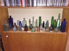 A collection of old medicine bottles etc.