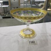 A hand decorated glass comport.