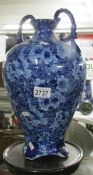 A blue floral twin handled vase.