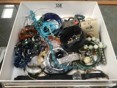 A quantity of costume jewellery including watches.