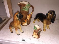 A quantity of Hornsea Royal fauna jugs and 2 dog ornaments