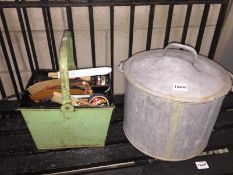 A galvanise bucket with lid & a metal basket with contents