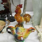 A Staffordshire rooster teapot and a rooster figure.