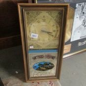 A Southern Comfort advertising clock.
