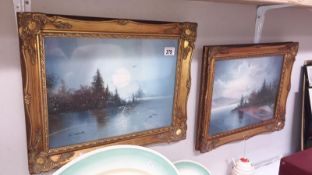 A pair of gilt framed and glazed oil on canvas lake views by W Zeller.