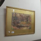 A framed and glazed rural scene watercolour signed J G Sykes.