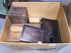 A quantity of wooden boxes in shoe cleaning and a stationary box