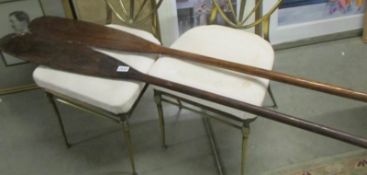 A pair of old tribal oars.
