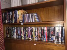 A quantity of Dvd's & CD's