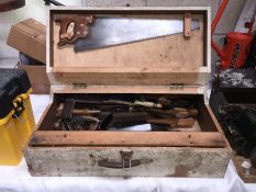 A vintage case of carpenters tools including saws & planes etc.