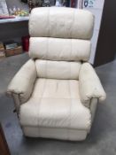 A cream leather reclining chair.