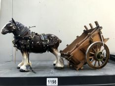 A Shire horse with cart