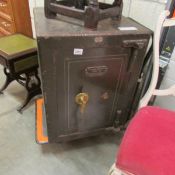A heavy old safe by Thos. Withers & Sons Ltd., West Bromwich, England.