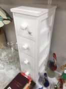 A white painted bathroom chest of drawers