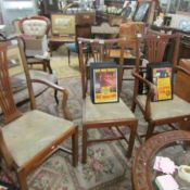 2 carver chairs and a matching dining chair.