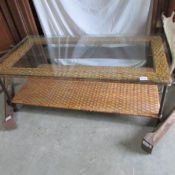 A glass topped coffee table.