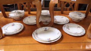 A quantity of Frank Buckley dinnerware including plates and tureens