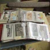 8 albums of assorted post cards.