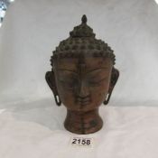 A 20th century Chinese Buddha head.