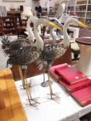 3 metal and 1 plastic stork ornaments (some light up)